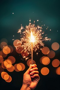 Sparkler fireworks hand holding. AI generated Image by rawpixel.
