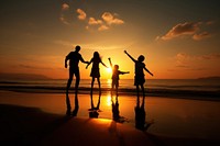 Asian family beach silhouette vacation. 