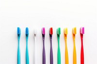 Colorful toothbrushes white background copy space variation. 