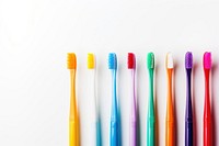 Colorful toothbrushes white background copy space variation. 