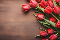 Woman making red tulips flower bouquet petal plant wood. AI generated Image by rawpixel.