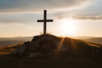 Cross outdoors nature sunset. 