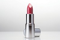 Lipstick cosmetics white background fashion. 