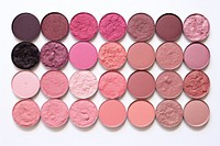 Pink eyeshadow palette cosmetics white background arrangement. 