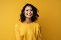 Young Thai woman portrait smiling yellow. 