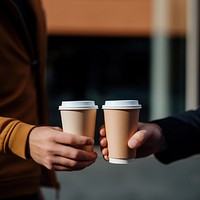 Coffee hand cup disposable. AI generated Image by rawpixel.
