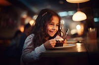 A girld eating cake dessert portrait photo. 