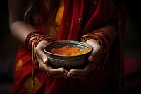 Holding adult woman bowl. 