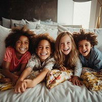Smiling children lying in bed. AI generated image by rawpixel.