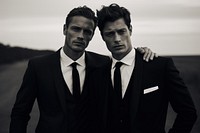 Two men wearing formal style photography portrait tuxedo. 