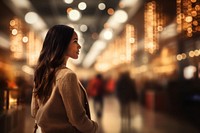 Defocused portrait shopping female. 