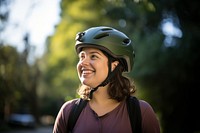 Helmet bicycle smiling looking. AI generated Image by rawpixel.