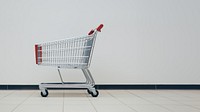 Empty shopping cart indoors.