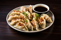 Dumpling sauce plate food. AI generated Image by rawpixel.