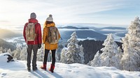 Rear of a Couple hikers with beautiful winter scene.  