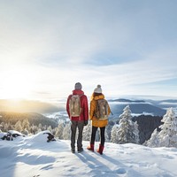 Rear of a Couple hikers with beautiful winter scene.  