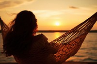 Hammock sea outdoors sunset. AI generated Image by rawpixel.