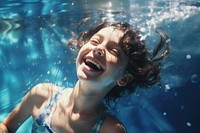 Fun swimming laughing portrait. 