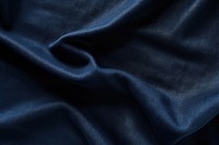 Dark blue fabric texture backgrounds crumpled wrinkled. AI generated Image by rawpixel.