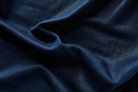 Dark blue fabric texture  crumpled wrinkled. 