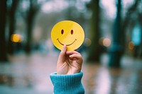 Happy smile face hand holding photo. AI generated Image by rawpixel.