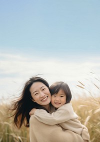 full body of Asian mother hug asian daughter. 