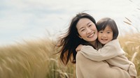 full body of Asian mother hug asian daughter. 