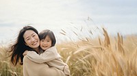 full body of Asian mother hug asian daughter. 