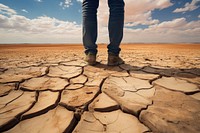 Racked earth desert floor outdoors standing nature. 