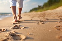 Human footsprint on sand beach in summer,. 