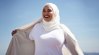 photo of a Musilm plus size woman wearing clean white hijab. 