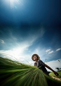 photo of a woman working sustainable farming. 