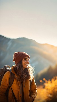 Photo of happy smiling woman hiking in mountains. AI generated Image by rawpixel.
