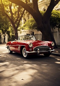 photo of red vintage car isolated on off white background. 