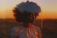 African american woman contemplation landscape hairstyle. 