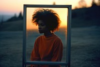 African american woman photography portrait outdoors. 