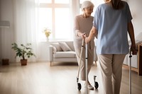 Senior woman using walking cane. 