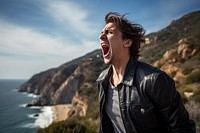 Young adult shouting cliff sea. AI generated Image by rawpixel.