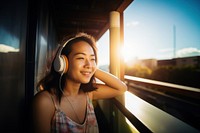 Woman wearing headphones. 