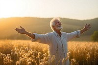 Joyful old man sunlight summer field. AI generated Image by rawpixel.