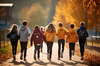 Students wearing Gym clothes outdoors walking running. 