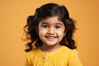 Indian little girl portrait smiling child. AI generated Image by rawpixel.