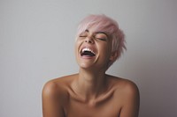 Laughing pink-haired woman, happy photo. .