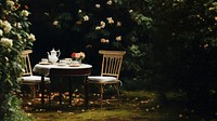 Photo of aftenoon tea in the garden. AI generated Image by rawpixel.