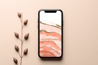 Smartphone screen with peachy wallpaper