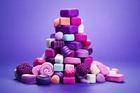 Delicious candy arrangement confectionery dessert purple. AI generated Image by rawpixel.