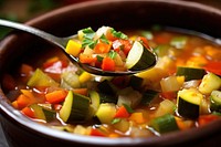 Healthy vegetarian meal spoon soup food. AI generated Image by rawpixel.