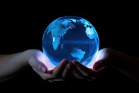 Hand holding blue digital global sphere planet space. 