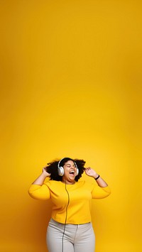 photo of a happy chubby woman wearing earphones.  