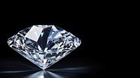 Photo of diamond, isolated on black background.  